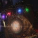 Thanos wielding a fully armed and operational Infinity Gauntlet.